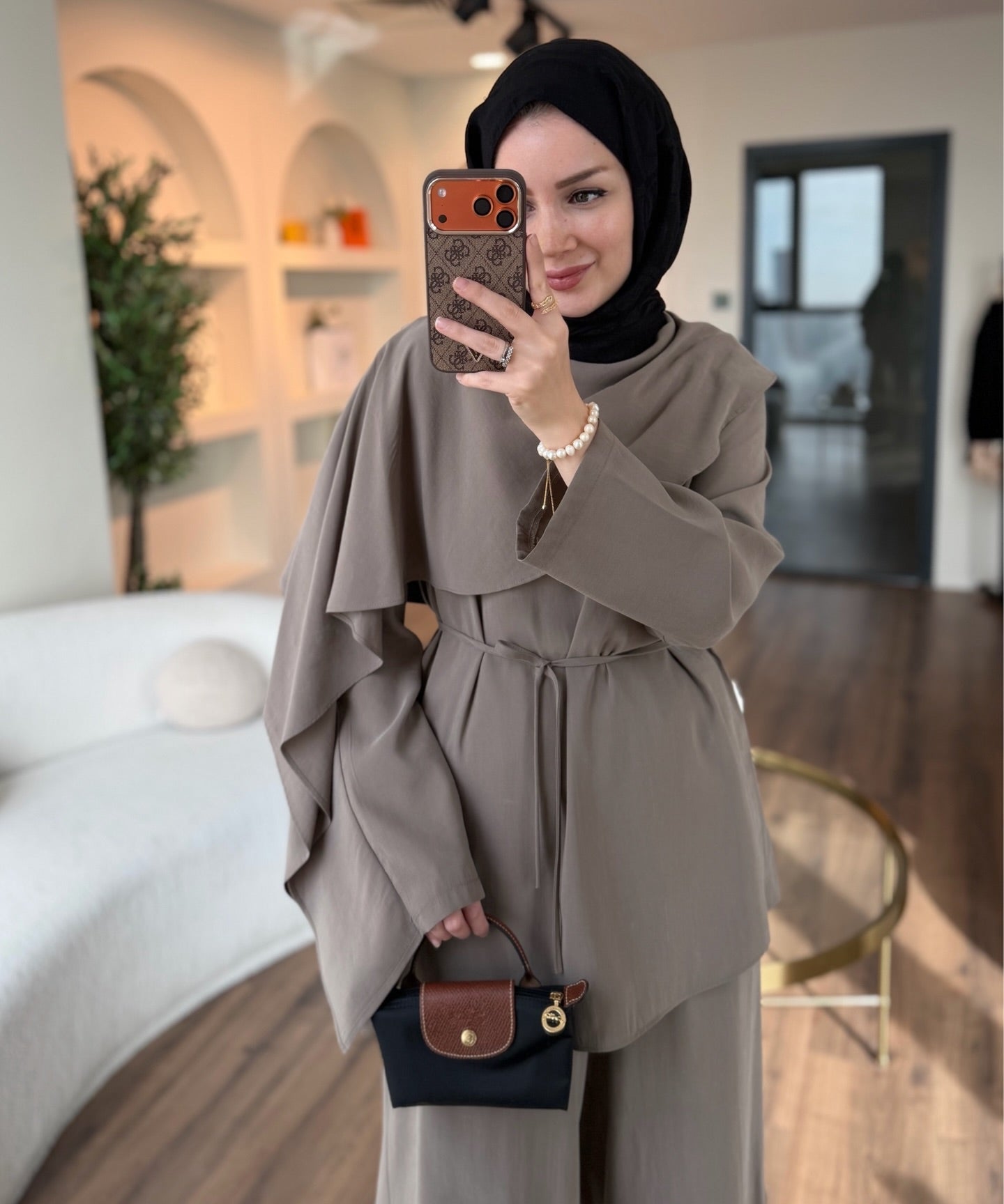 layered wrap cape-style overlay and a waist tie with wide-leg pants co-ord set