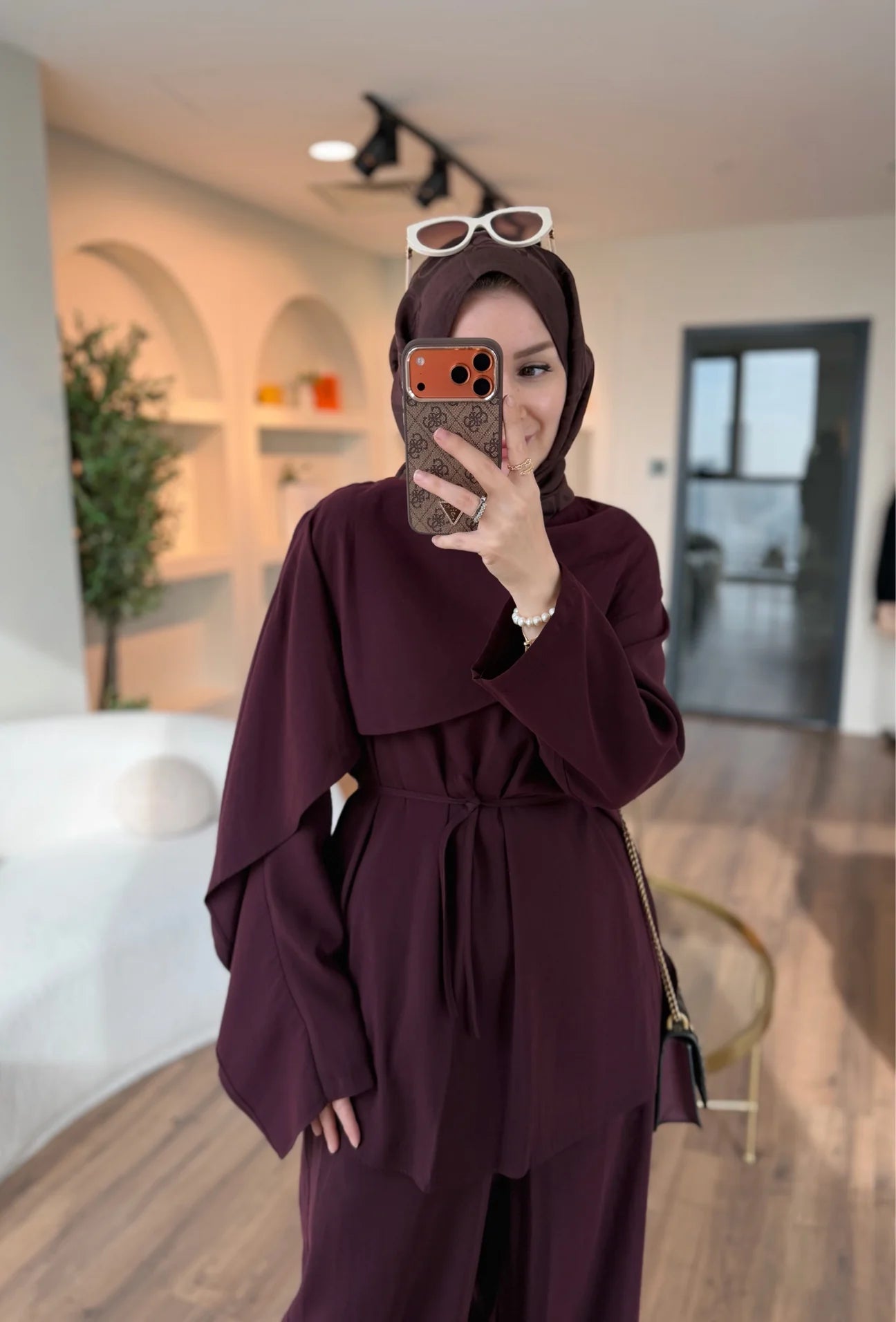 layered wrap cape-style overlay and a waist tie with wide-leg pants co-ord set