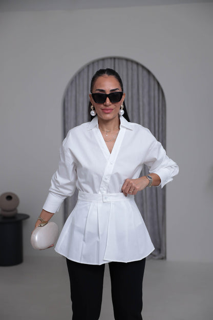 Two-piece shirt (wrappable like a skirt) in white poplin fabric with an elegant design