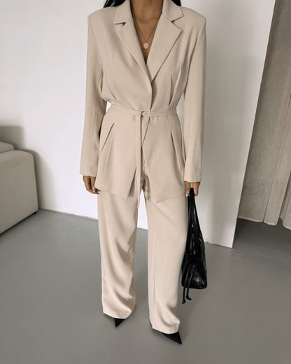 Belted Featuring pleats at the waist