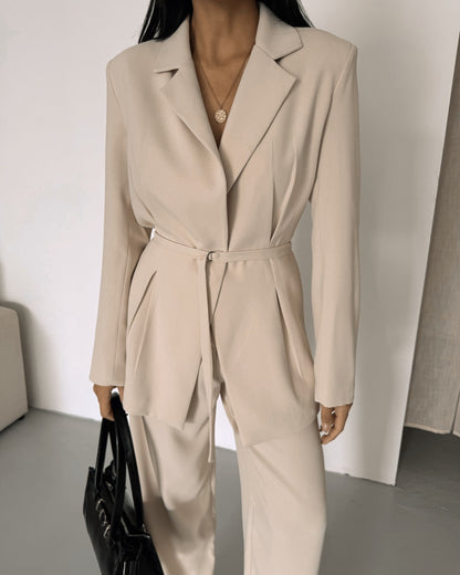 Belted Featuring pleats at the waist