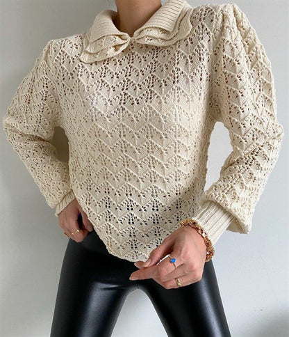 Knitted blouse with openwork details