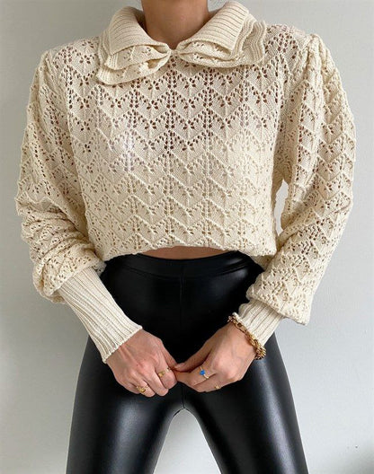 Knitted blouse with openwork details