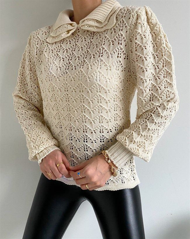 Knitted blouse with openwork details