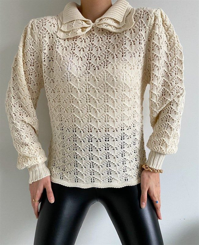 Knitted blouse with openwork details
