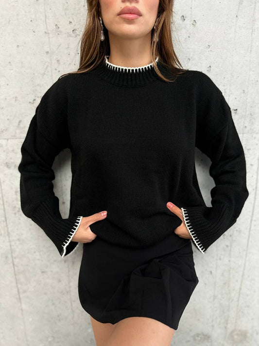 Knitted blouse with stitching details