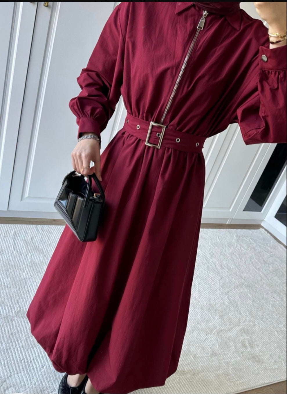 belted dress with puffy bottom