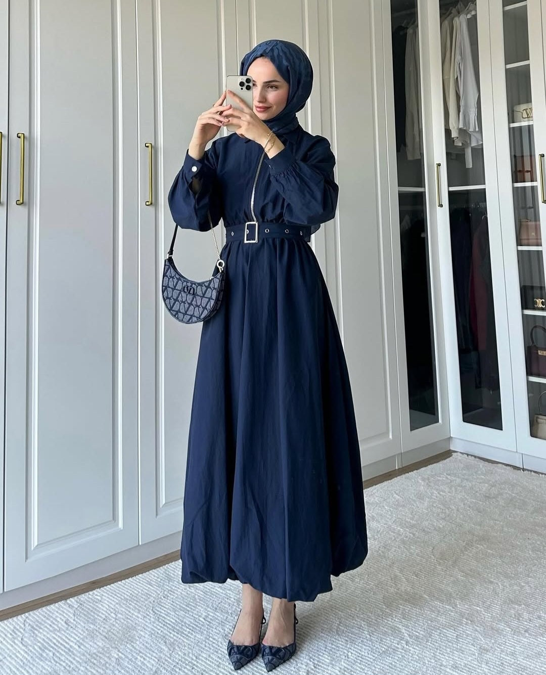 belted dress with puffy bottom