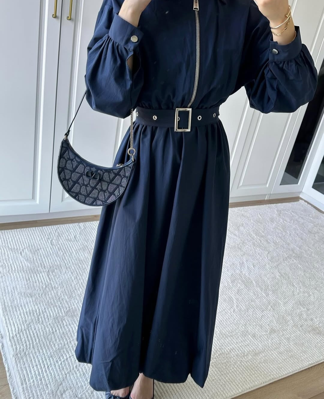 belted dress with puffy bottom