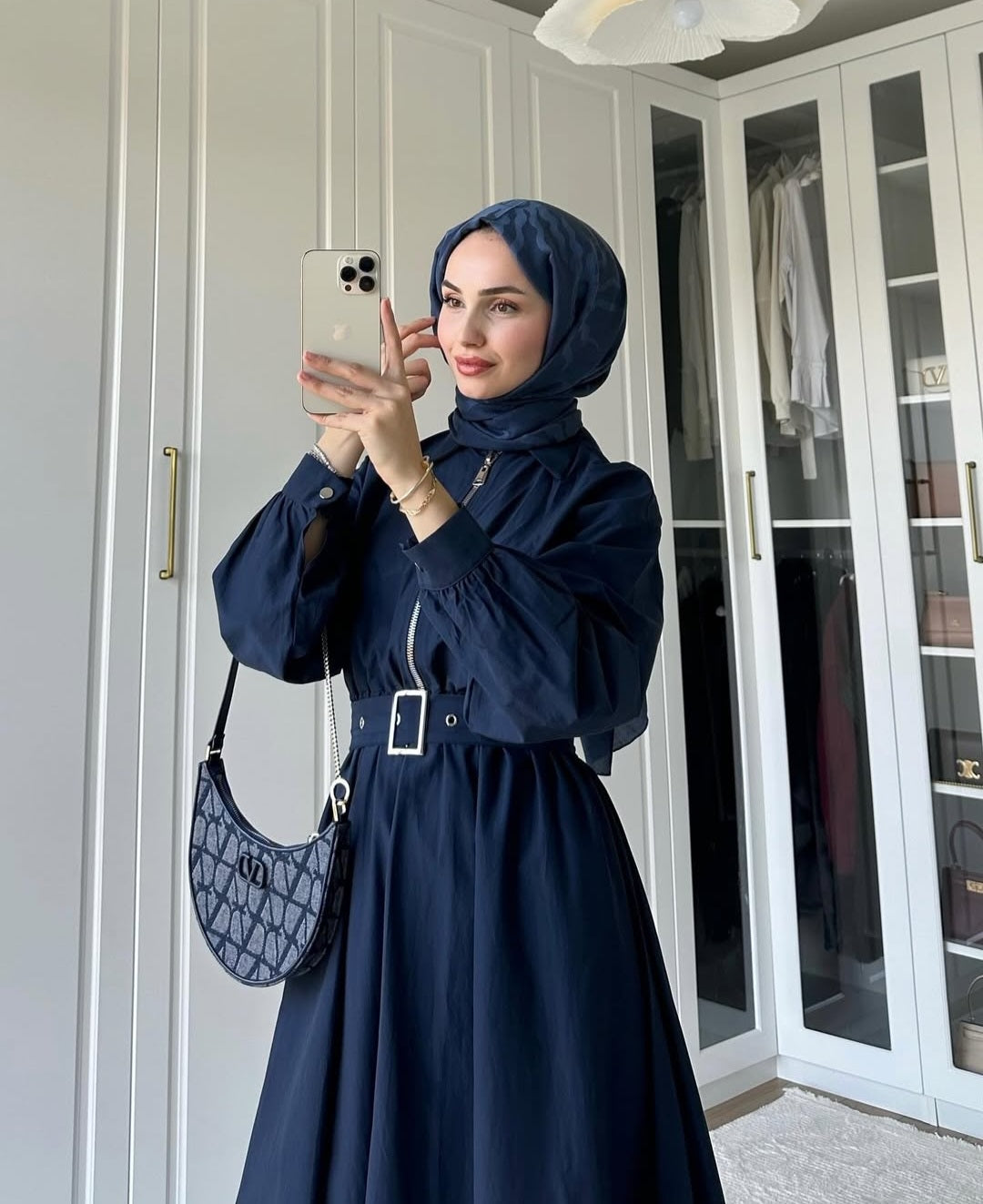 belted dress with puffy bottom