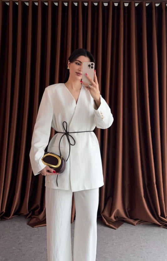 Striped blazer with a soft leather belt, wide trouser co-ord suit