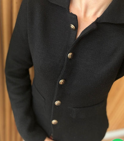 Knitted jacket with gold buttons