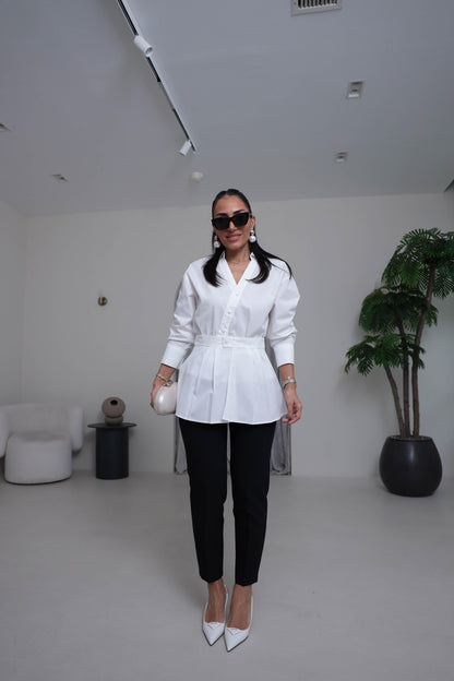 Two-piece shirt (wrappable like a skirt) in white poplin fabric with an elegant design