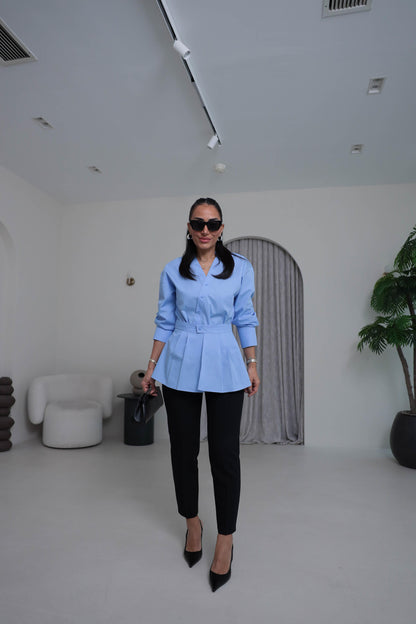 Two-piece shirt (wrappable like a skirt) in white poplin fabric with an elegant design