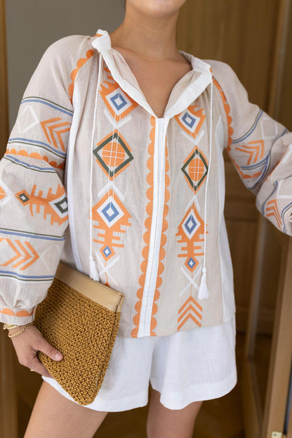 Blouse with embroidery details