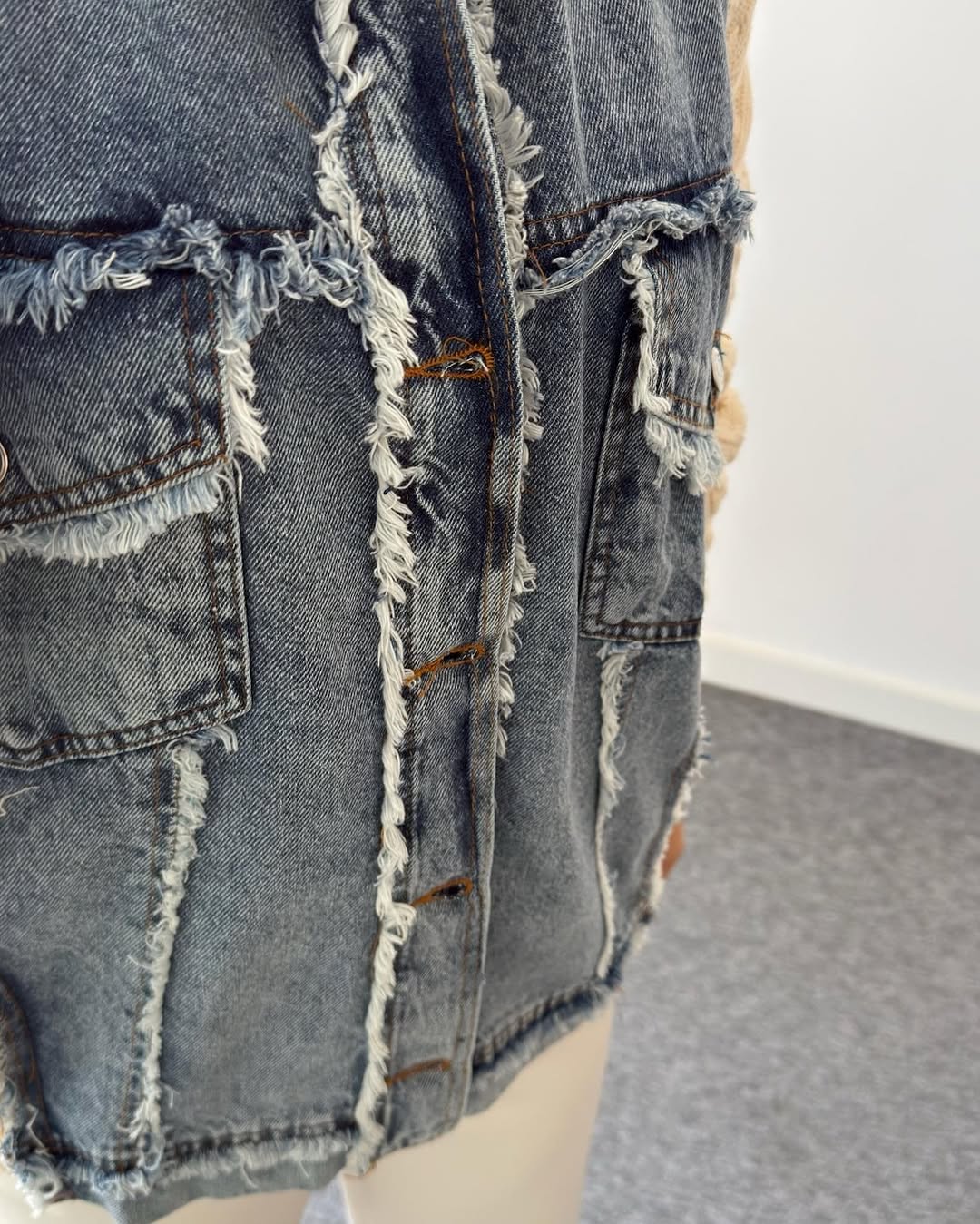 Jeans jacket with knitted details