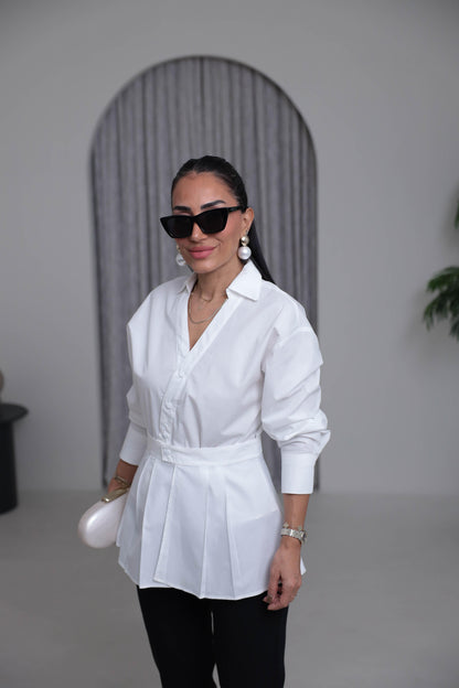 Two-piece shirt (wrappable like a skirt) in white poplin fabric with an elegant design