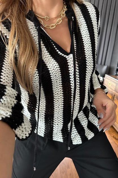 Fully perforated knitted blouse