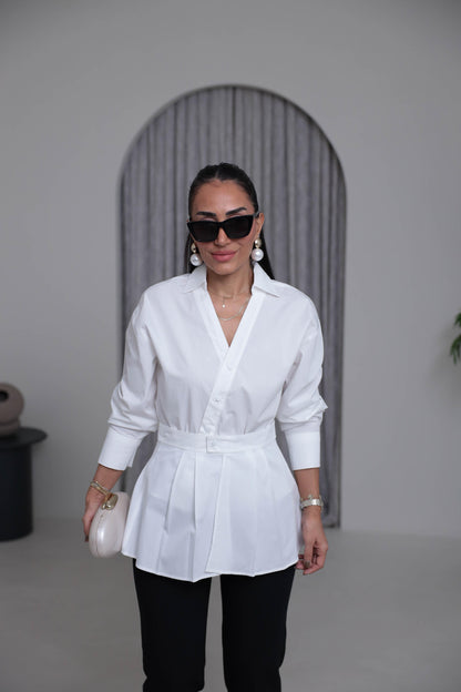 Two-piece shirt (wrappable like a skirt) in white poplin fabric with an elegant design