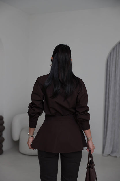 Two-piece shirt (wrappable like a skirt) in white poplin fabric with an elegant design