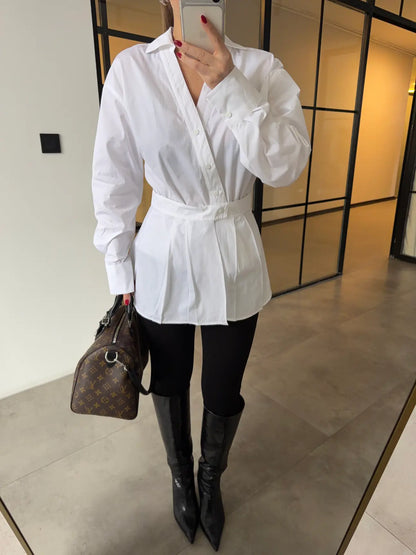 Two-piece shirt (wrappable like a skirt) in white poplin fabric with an elegant design