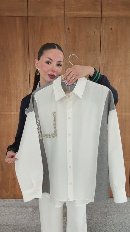 Knitwear details studded with rhinestone