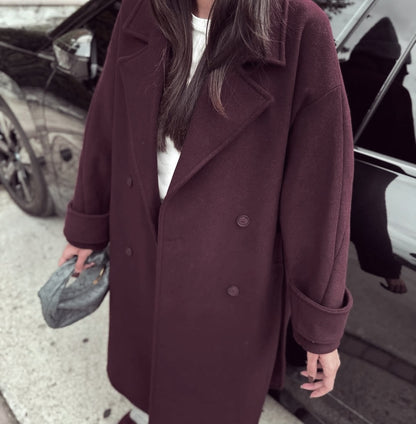 Double breasted belted coat