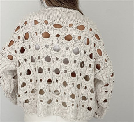 Knitted blouse with openwork