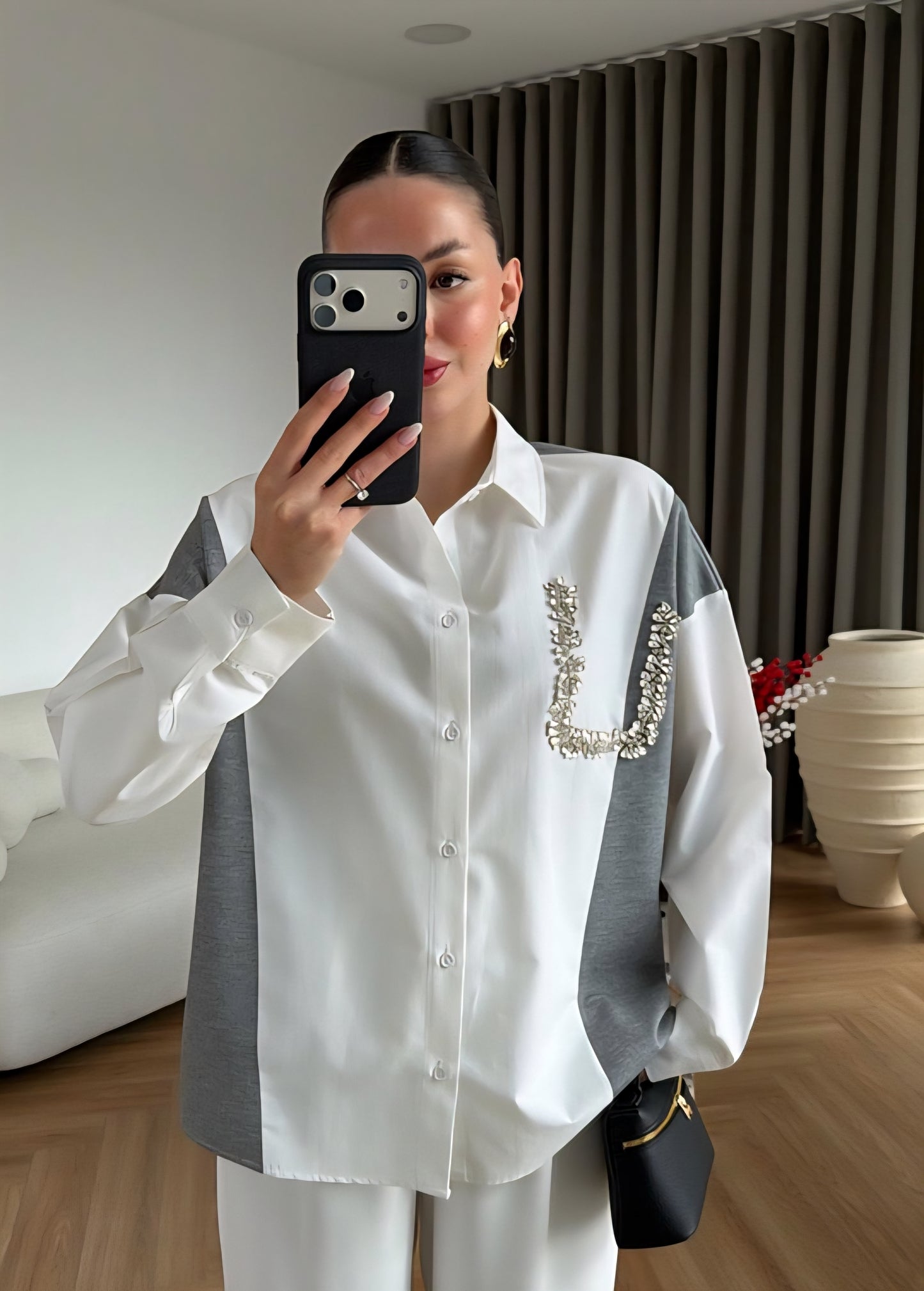 Knitwear details studded with rhinestone