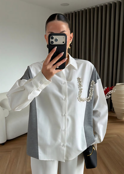 Knitwear details studded with rhinestone