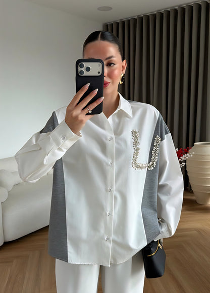 Knitwear details studded with rhinestone